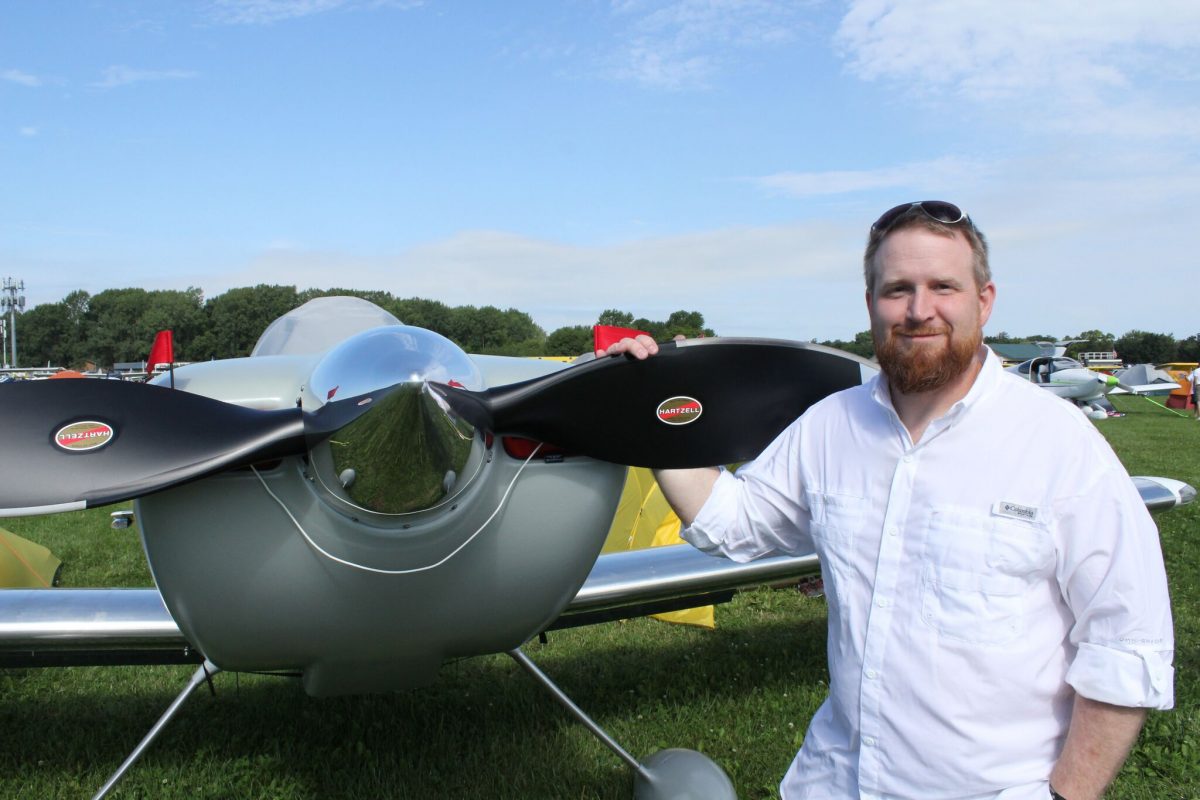 Pilot poses with his Hartzell aircraft propeller